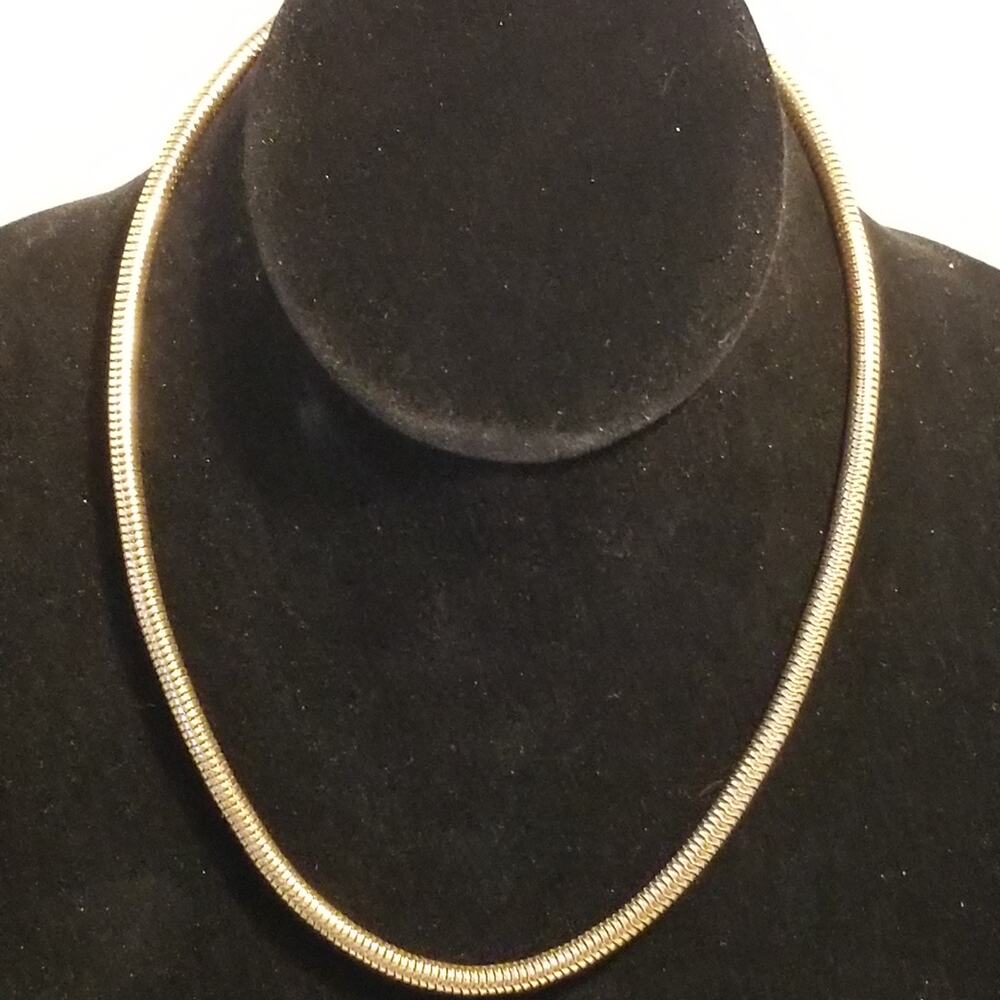 Gold tone snake chain choker 16" with a 3 " extension